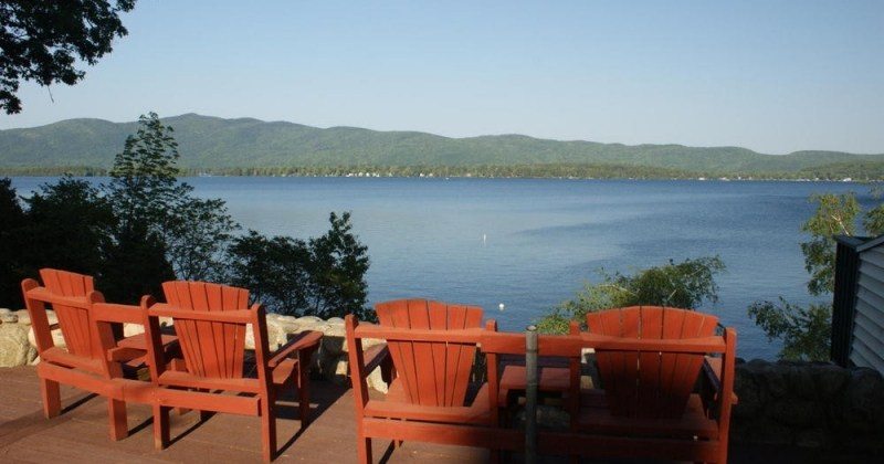 Adirondack chairs overlooking the lake.