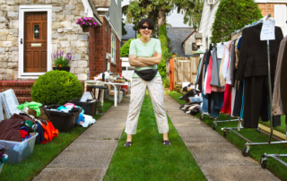Picture of woman enjoying world's largest garage sale.