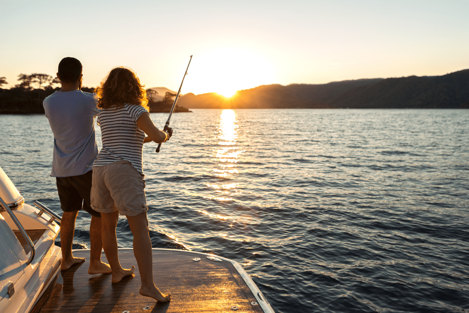 Picture of couple on a Lake George fishing adventure.